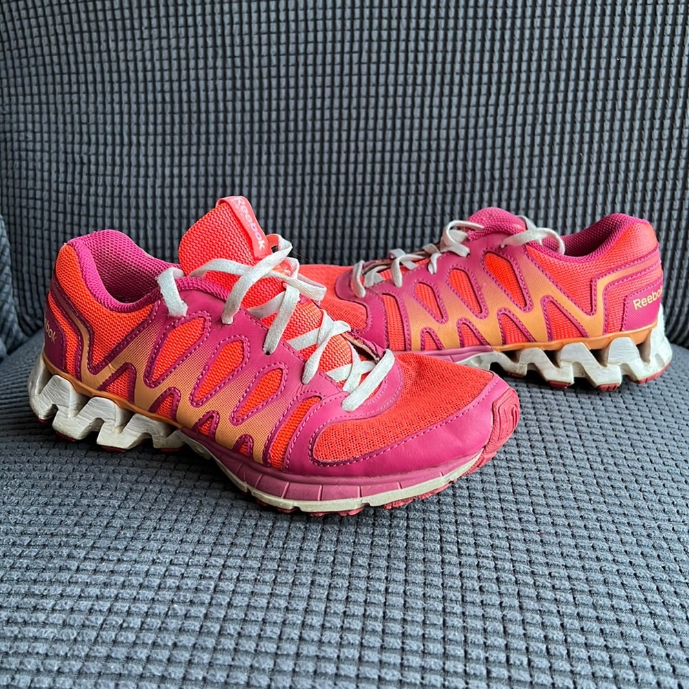 Reebok pink orange and white tennis shoes